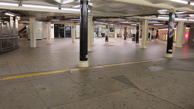 Times Sq mezzanine connecting the N/Q/R , 1/2/3, and Shuttle trains.  This mezzanine would have to be demolished and rebuilt to allow for the new shuttle loop. Image via Wikipedia.