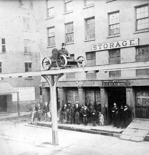 Charles Thompson Harvey making a southbound test run along the Greenwich Street portion of his cable-driven West Side and Yonkers Patented Railway. This image was taken in December 1867 at 39 Greenwich Street. Source Wikipedia via Joseph Brennan