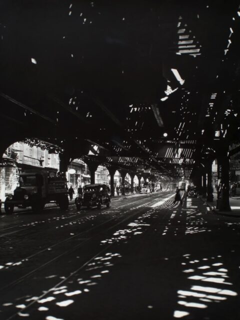 Third Avenue El above Bowery from Division St. Manhattan. Berenice Abbott/Courtesy The New York Public Library 